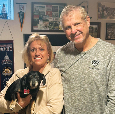 Liz and Walter Stubbs with their rescue dachshund Angel