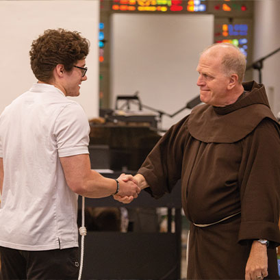 Photo of two people shaking hands. Link to Gifts That Pay You Income.